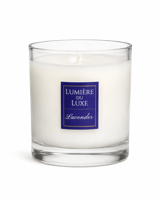 White Lavender Candle with a blue and gold 'Lumérie du Luxe' label 