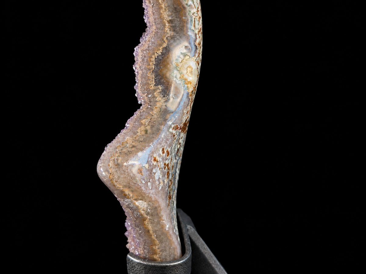Close-up of a natural druzy agate edge with sparkling chalcedony crystals — one-of-a-kind mineral home decor.