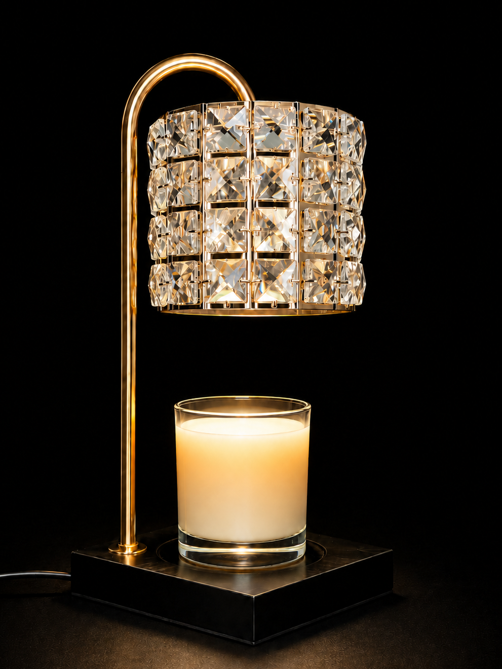 Decorative wax warmer lamp with crystal shade and wickless candle on a black background
